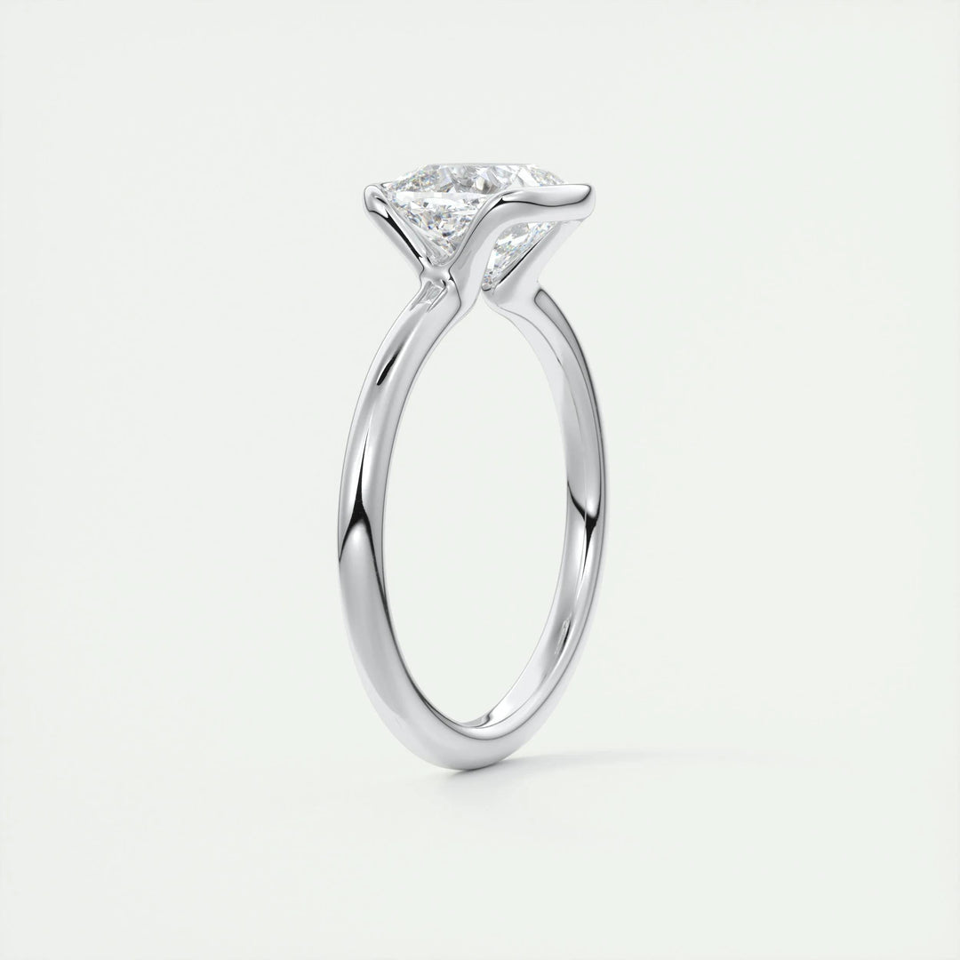 Cushion solitaire engagement ring finished in polished solid gold