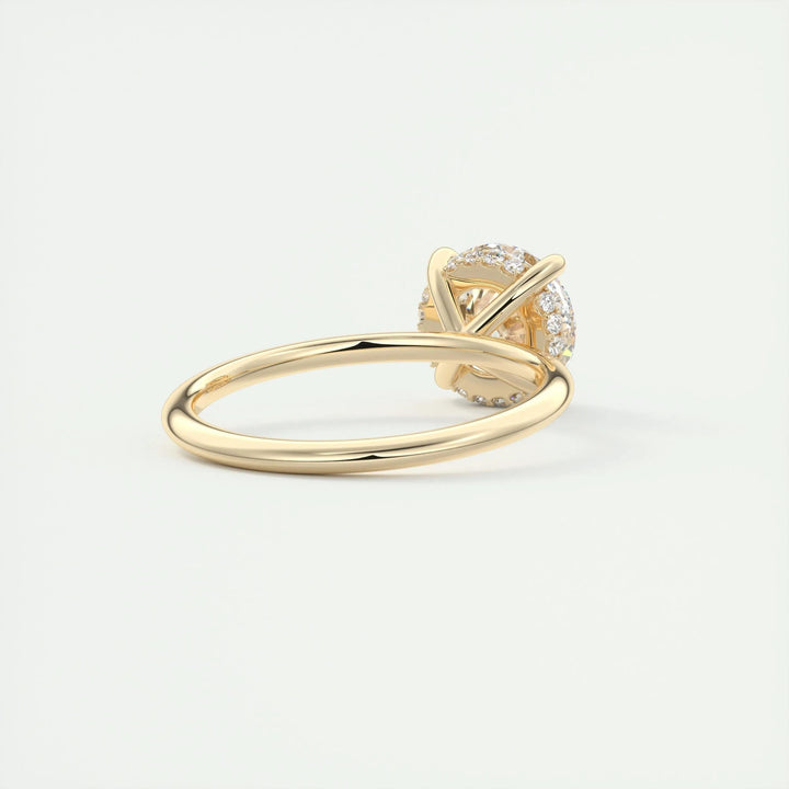 Lifestyle shot of round hidden halo diamond ring on hand