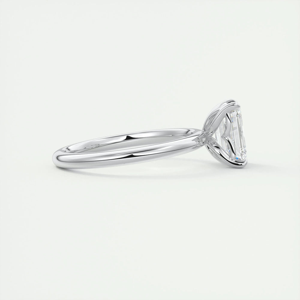 Macro shot of emerald cut diamond facets in solitaire ring setting