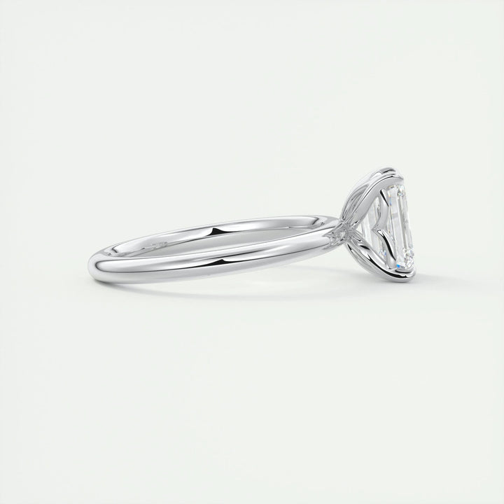 Macro shot of emerald cut diamond facets in solitaire ring setting
