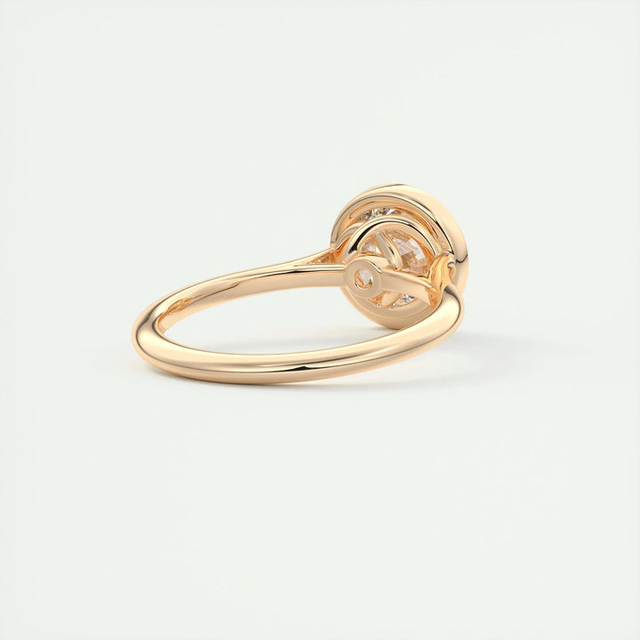 Profile view of round cut bezel engagement ring band