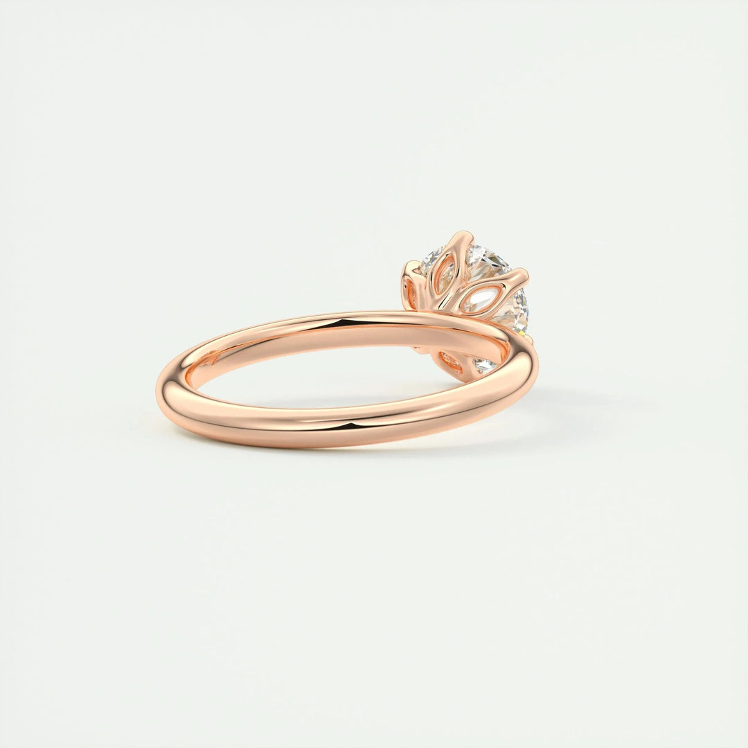 Round cut diamond ring worn on hand