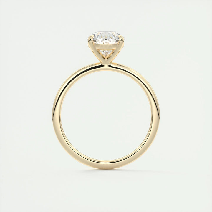 Pear cut solitaire engagement ring shown in real-life wear