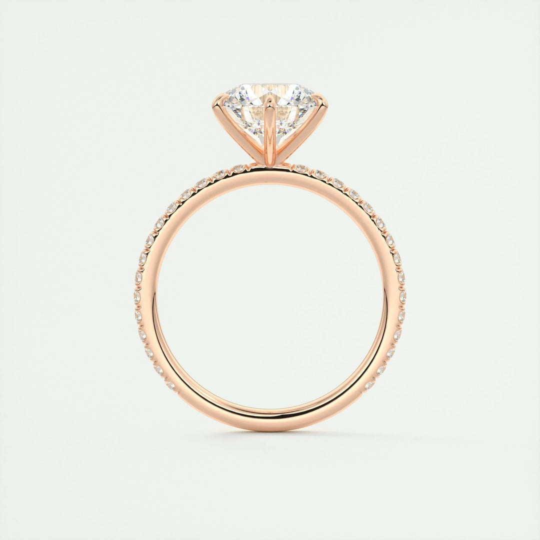 Profile view of round cut pave engagement ring band