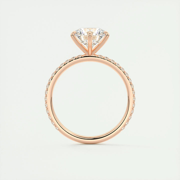 Profile view of round cut pave engagement ring band
