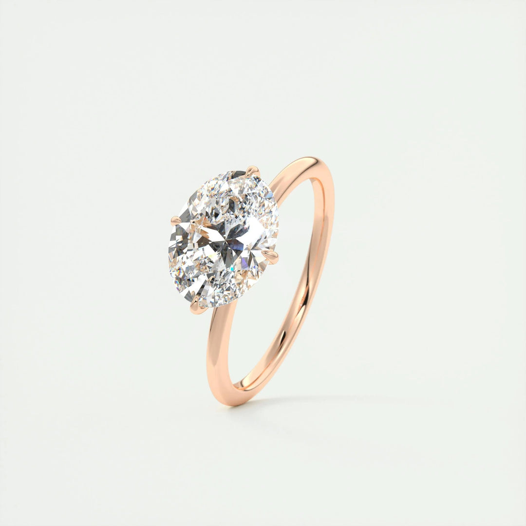 Angled view of oval cut diamond in hidden halo setting