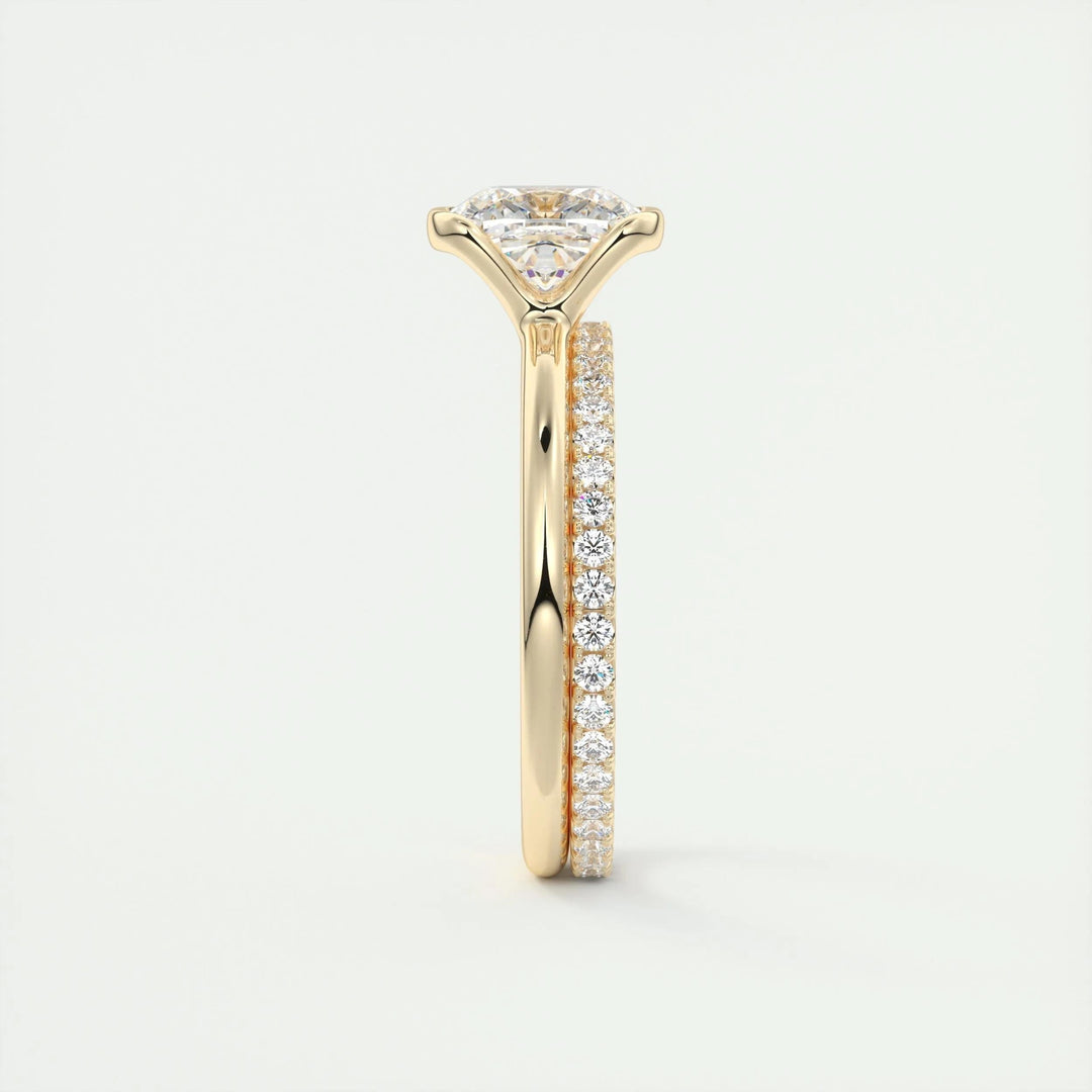 Cushion solitaire engagement ring close-up showing F-/VS1 diamond clarity