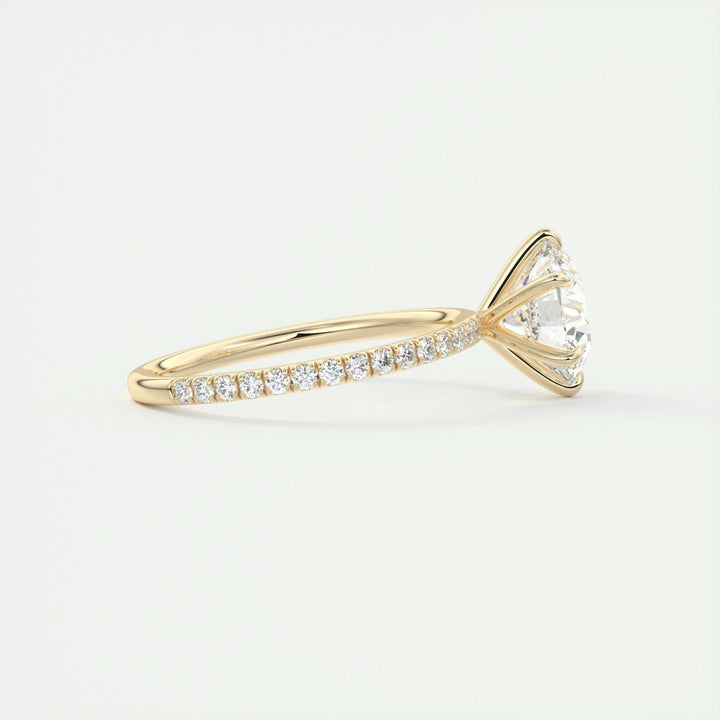 Top-down view of round cut pave engagement ring