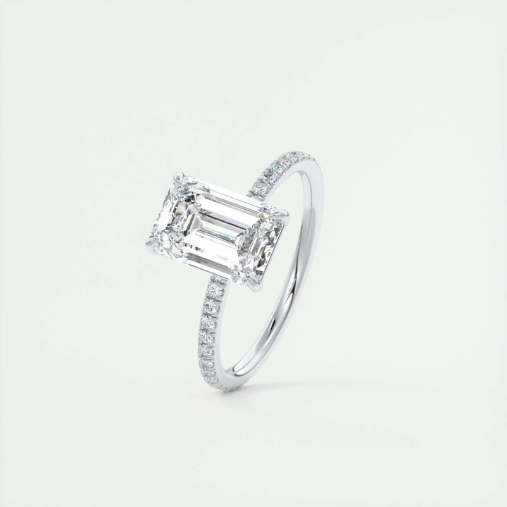 Unboxing view of emerald cut pave diamond engagement ring