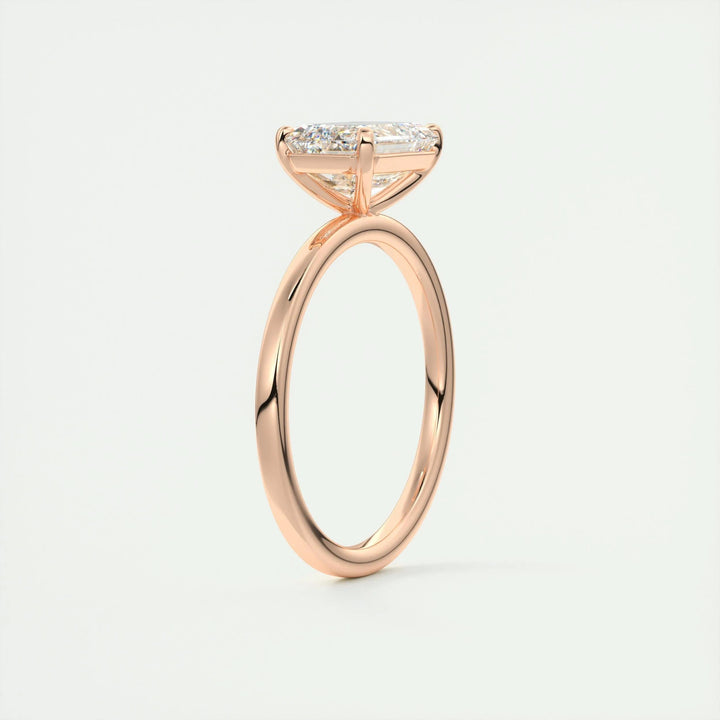 Premium emerald cut east west engagement ring crafted in solid gold
