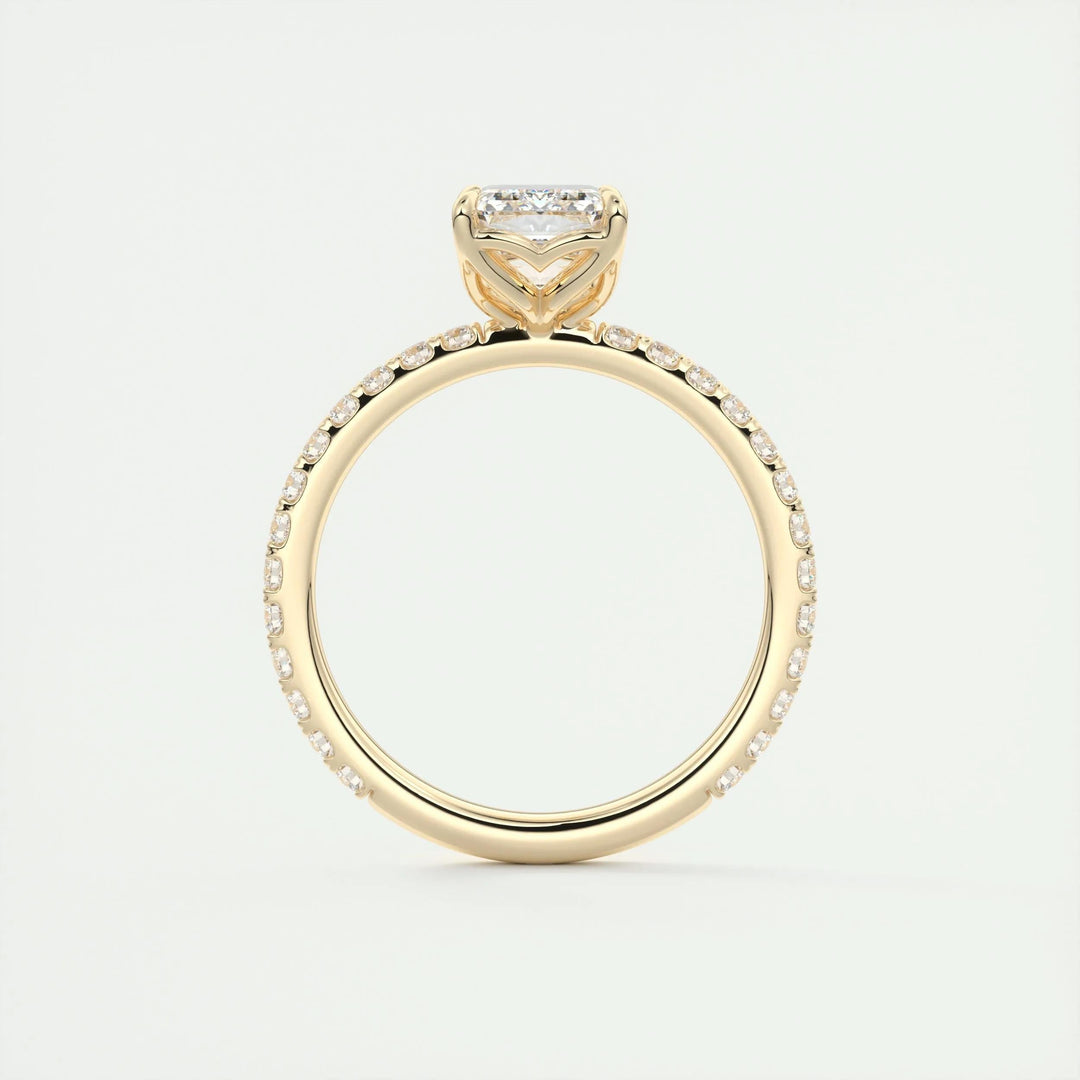 Angled view of emerald cut diamond in pave setting