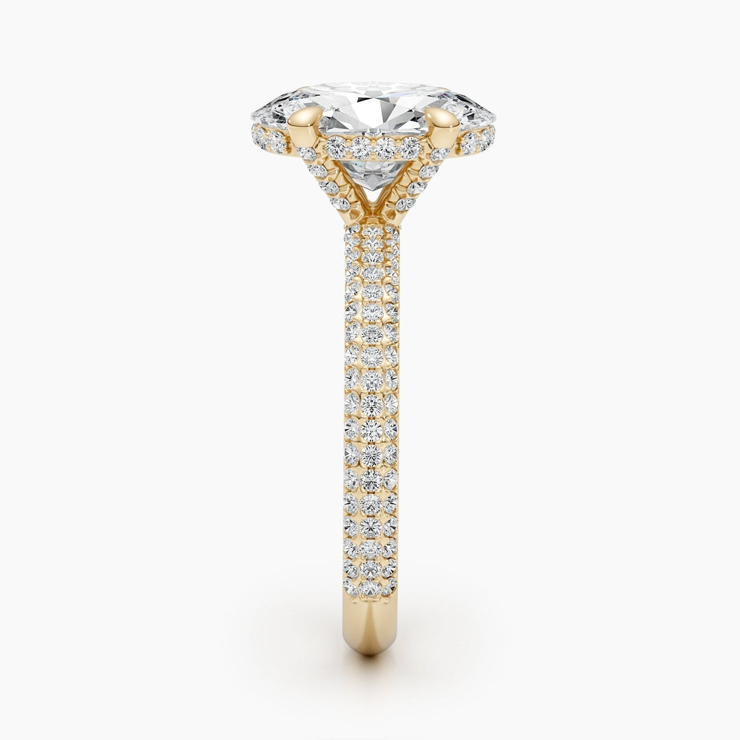 Oval hidden halo diamond ring displayed on jewelry stand