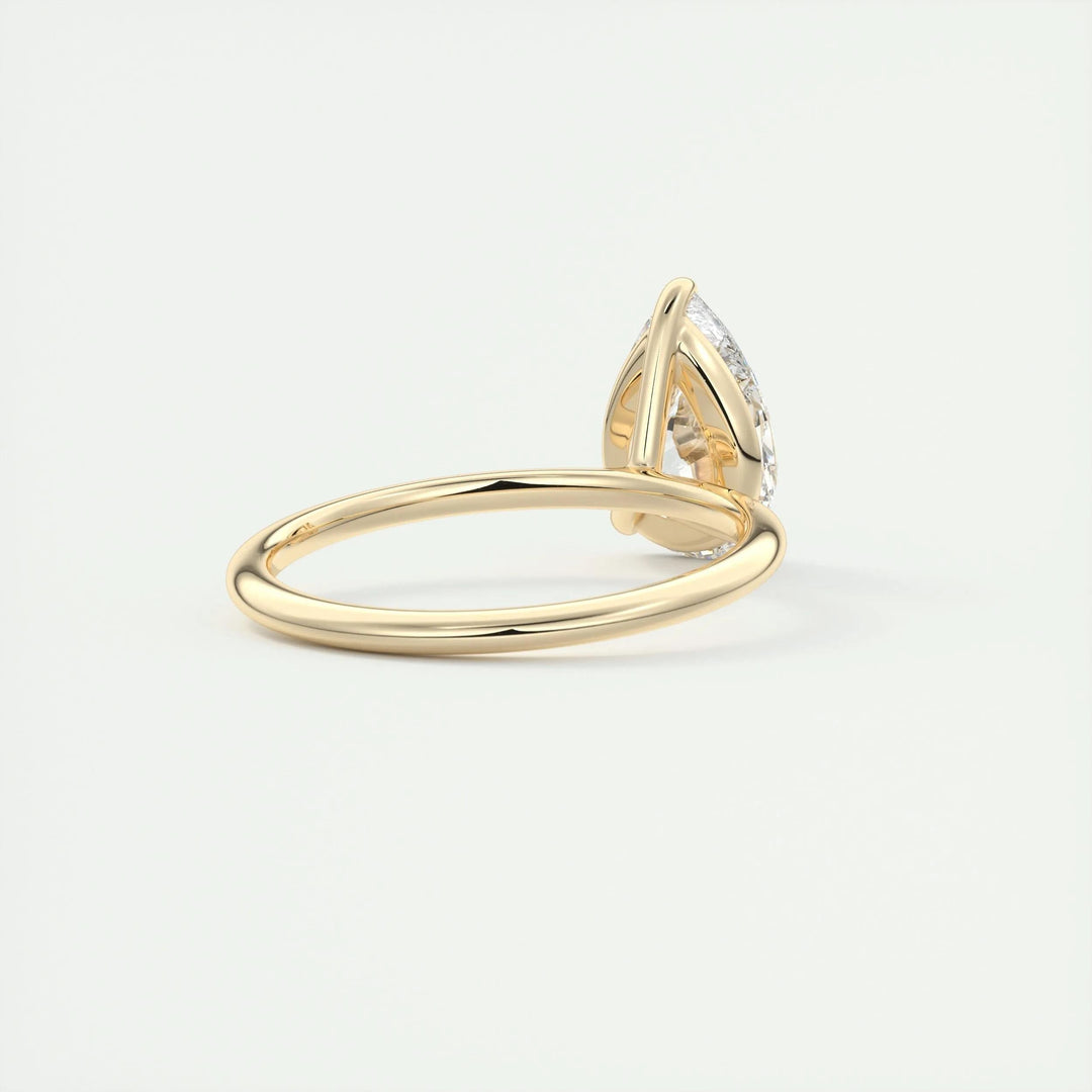Profile view of pear cut solitaire engagement ring band