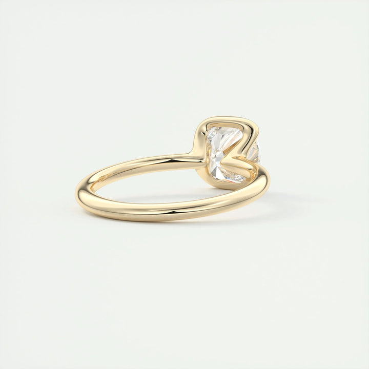Angled view of cushion cut diamond in solitaire setting