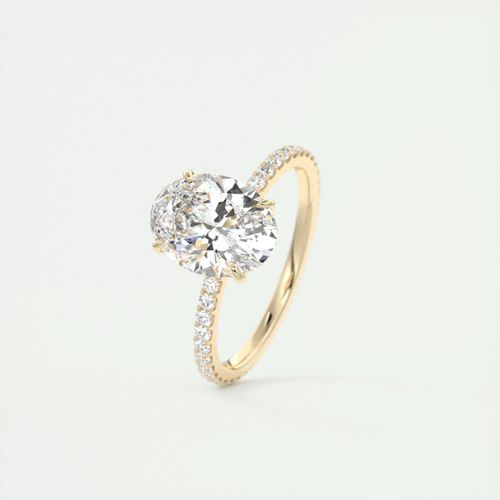 Oval cut diamond ring worn on hand