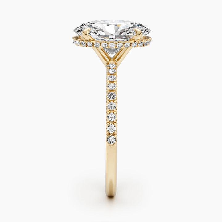 Oval cut pave engagement ring with IGI certified center diamond