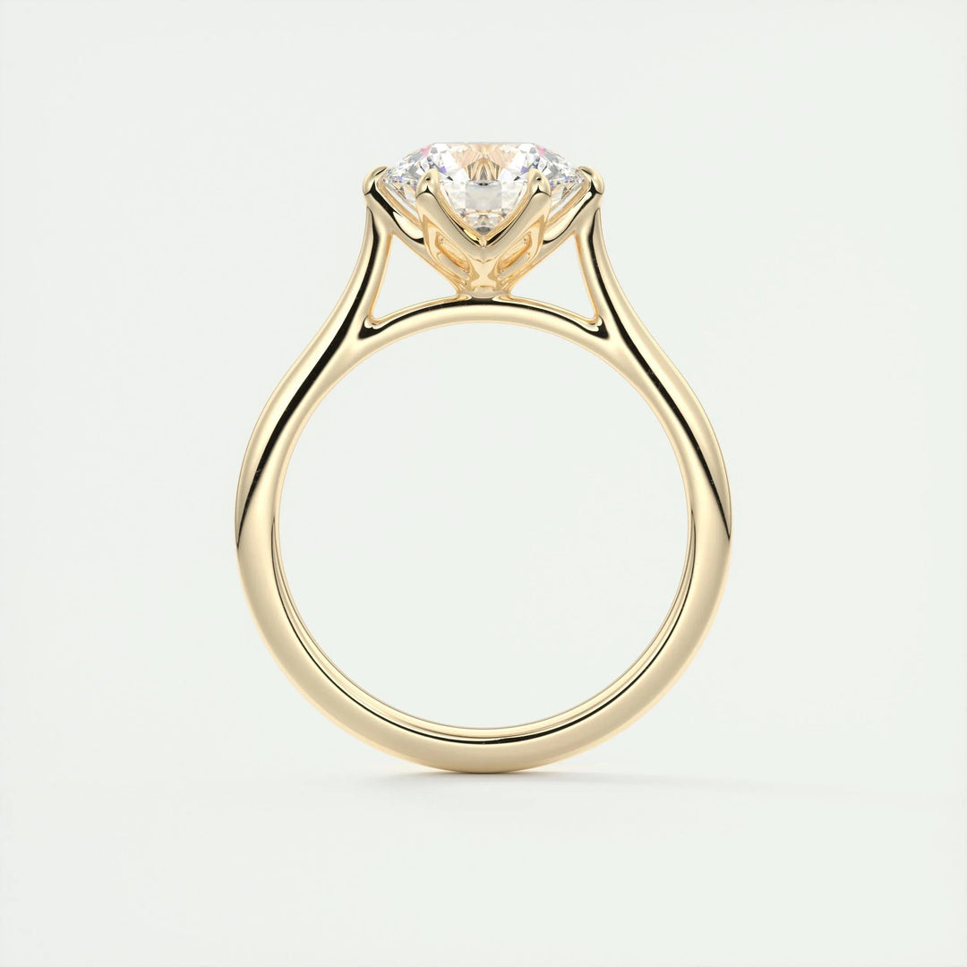 Round pave engagement ring offered in gold and platinum