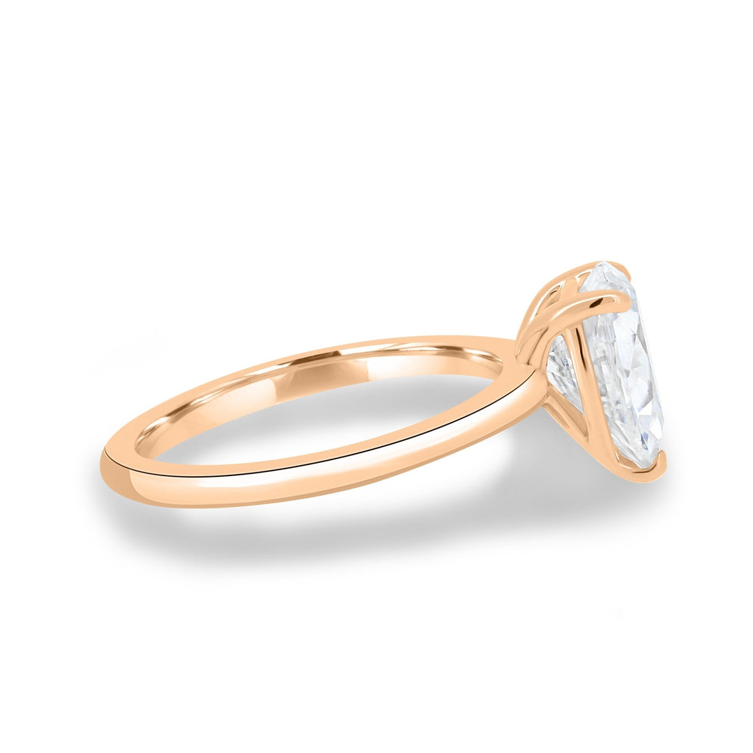Profile view of pear cut solitaire engagement ring band