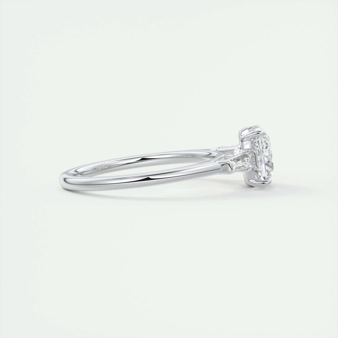 Cushion three stone ring set with an IGI graded diamond