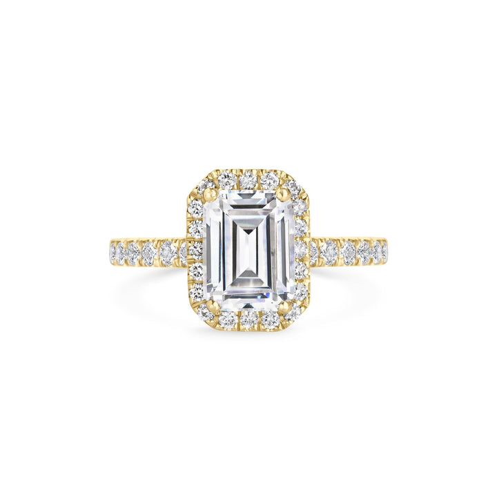 Emerald cut pave engagement ring shown in real-life wear