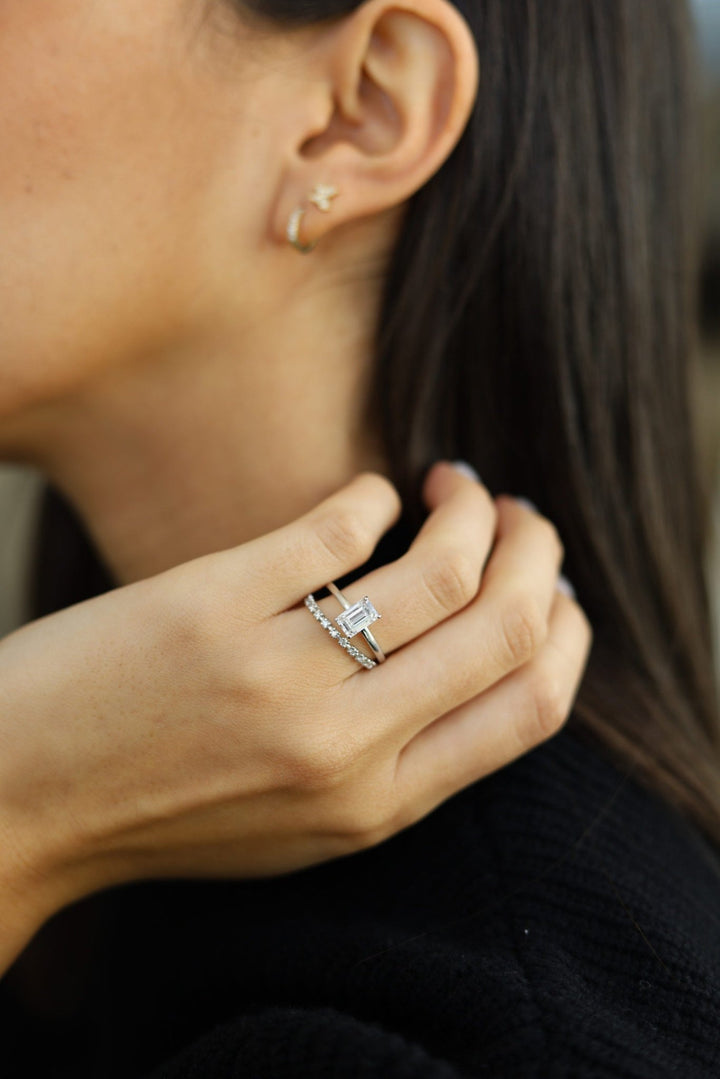 IGI certified emerald cut diamond in hidden halo engagement ring setting