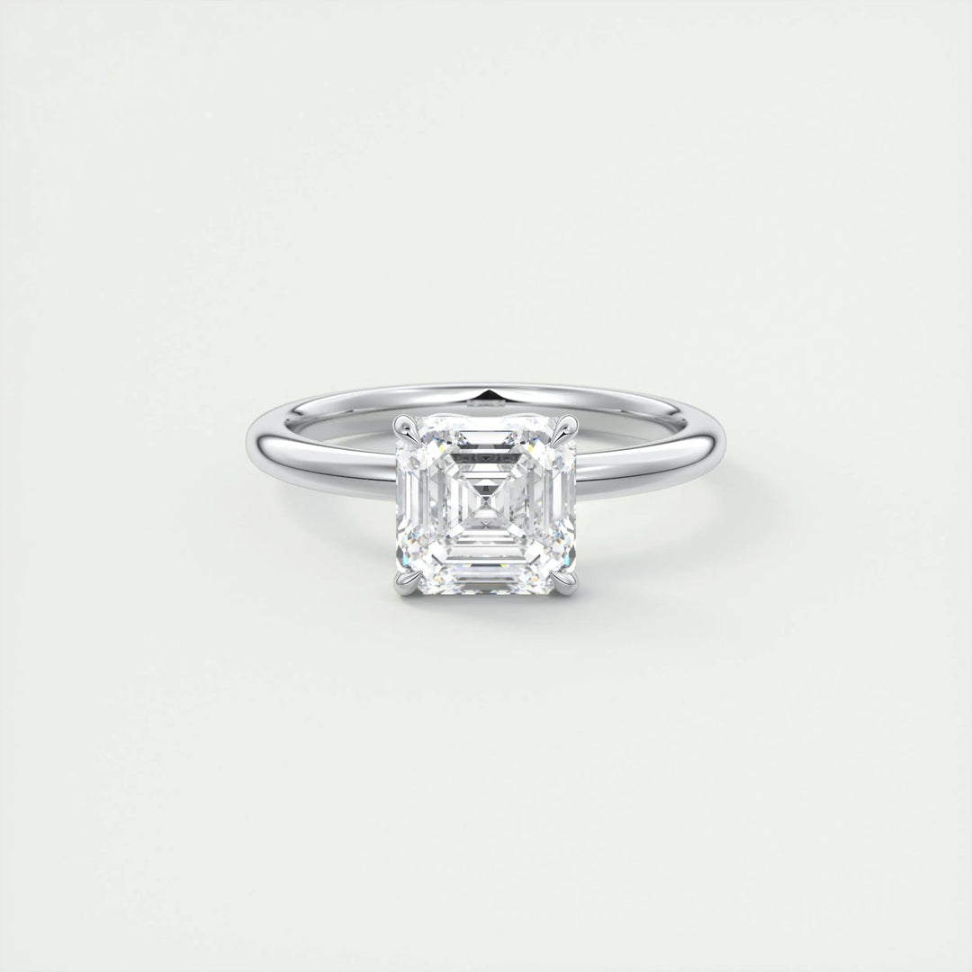 Close-up of asscher cut center diamond in solitaire engagement ring