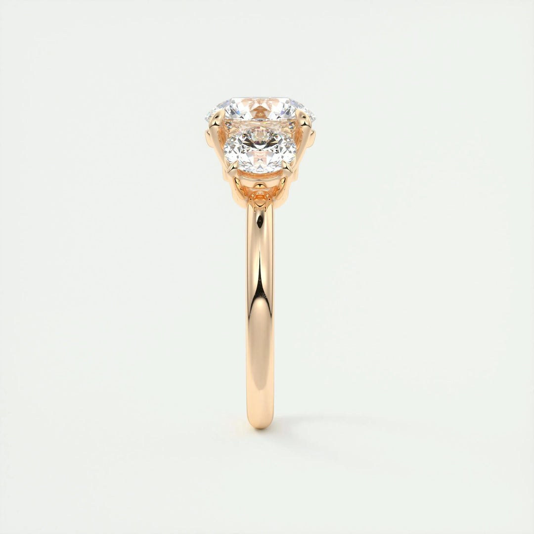 Detailed close-up of round three stone diamond engagement ring