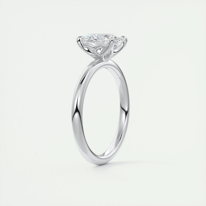 Oval solitaire lab grown diamond ring fitted on finger