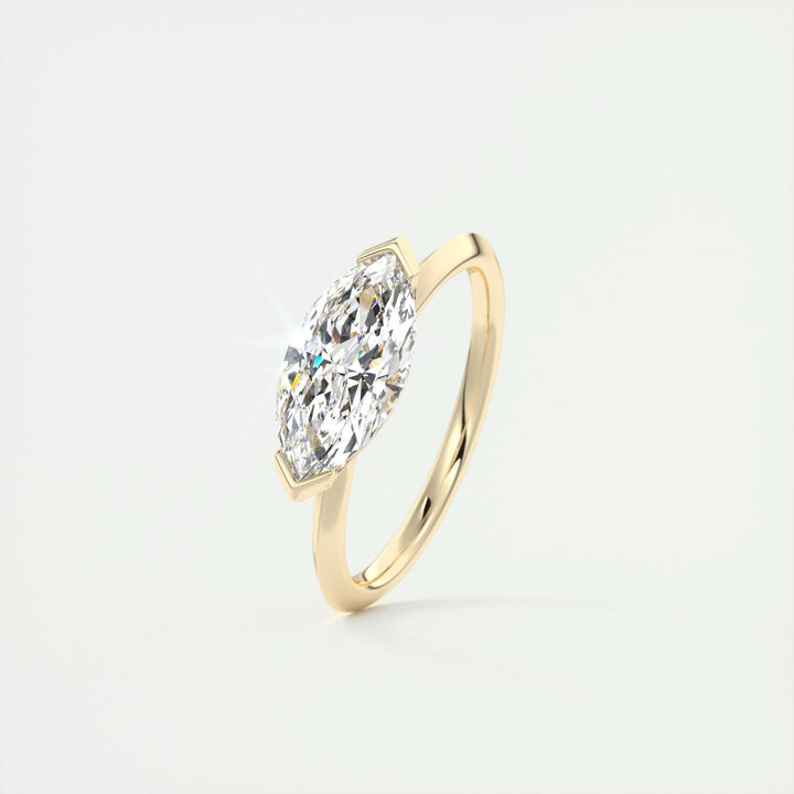 Detailed close-up of marquise solitaire diamond engagement ring