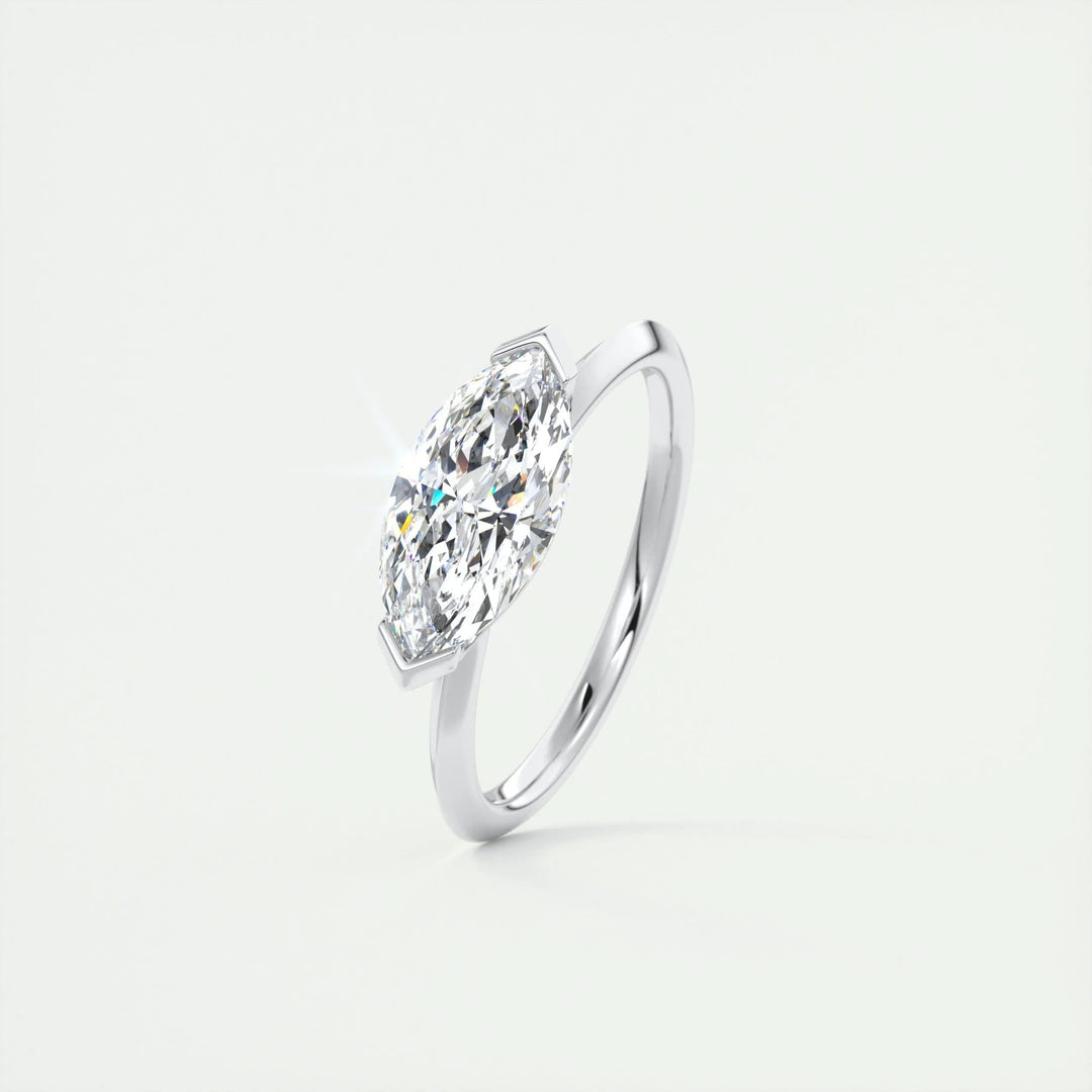 Marquise solitaire engagement ring finished in polished solid gold