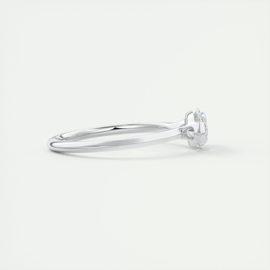 Fine craftsmanship detail on marquise solitaire engagement ring