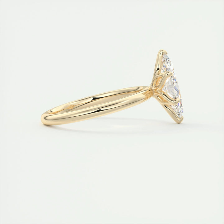 Fine craftsmanship detail on marquise solitaire engagement ring