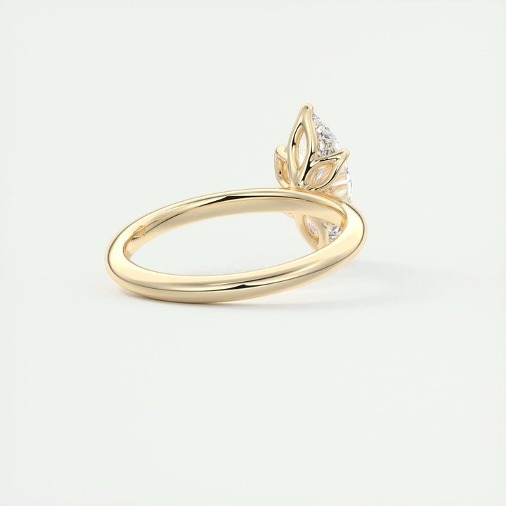 Marquise solitaire engagement ring finished in polished solid gold