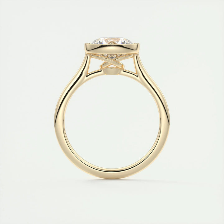 Round bezel lab grown diamond ring side profile in gold setting