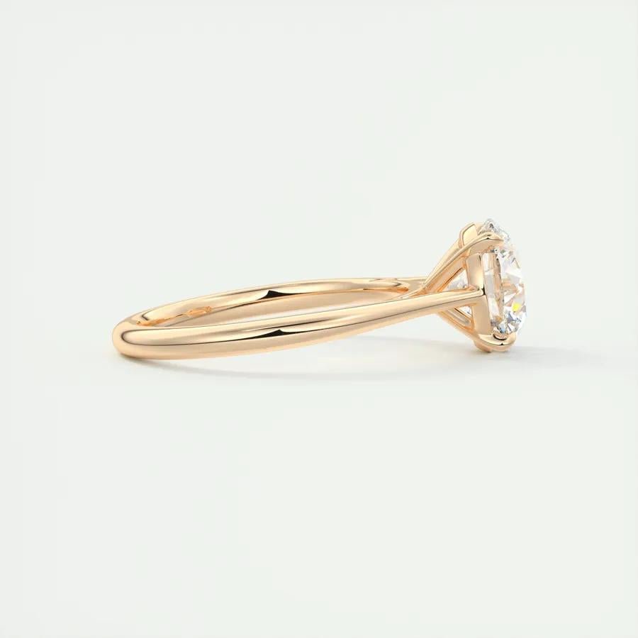 Close-up of round cut center diamond in solitaire engagement ring