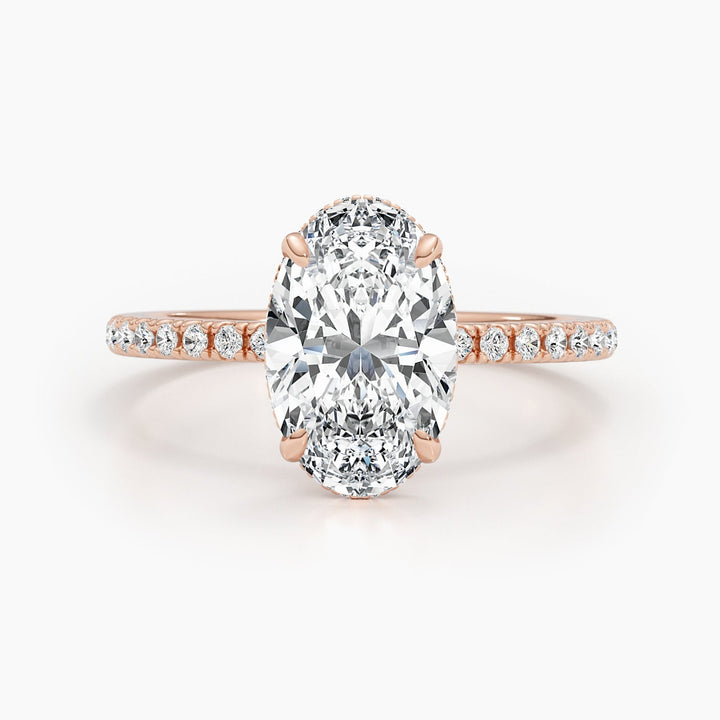 IGI certified oval cut diamond in pave engagement ring setting