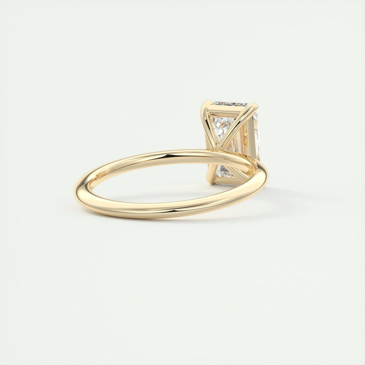 Detailed close-up of emerald solitaire diamond engagement ring