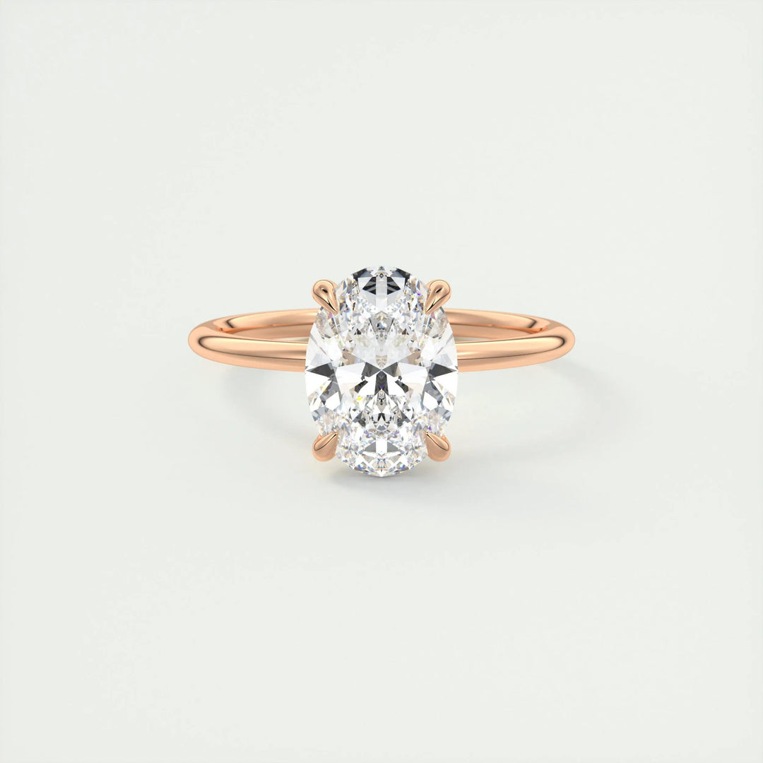 Premium oval cut hidden halo engagement ring crafted in solid gold
