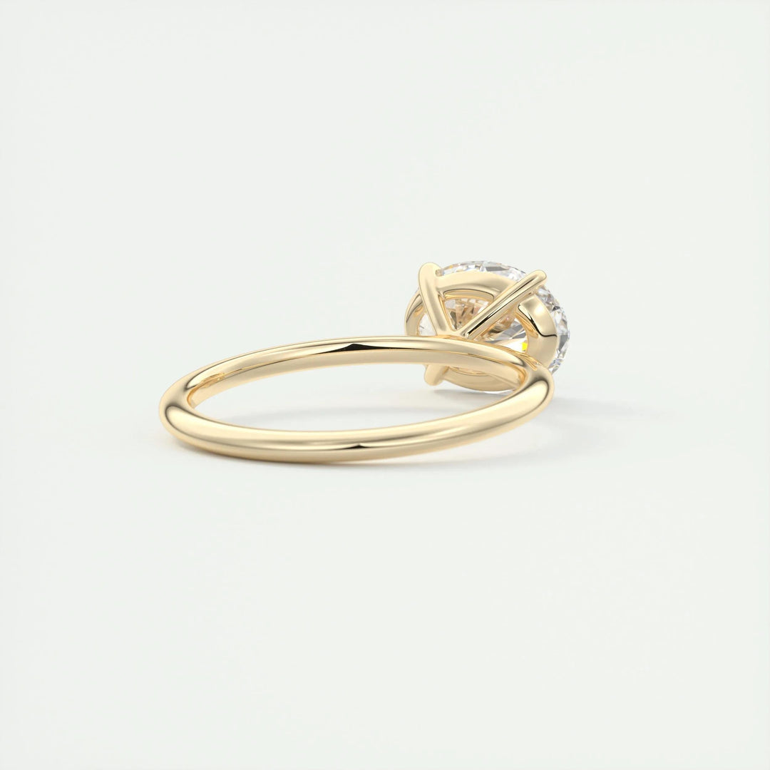 Angled view of oval cut diamond in east west setting
