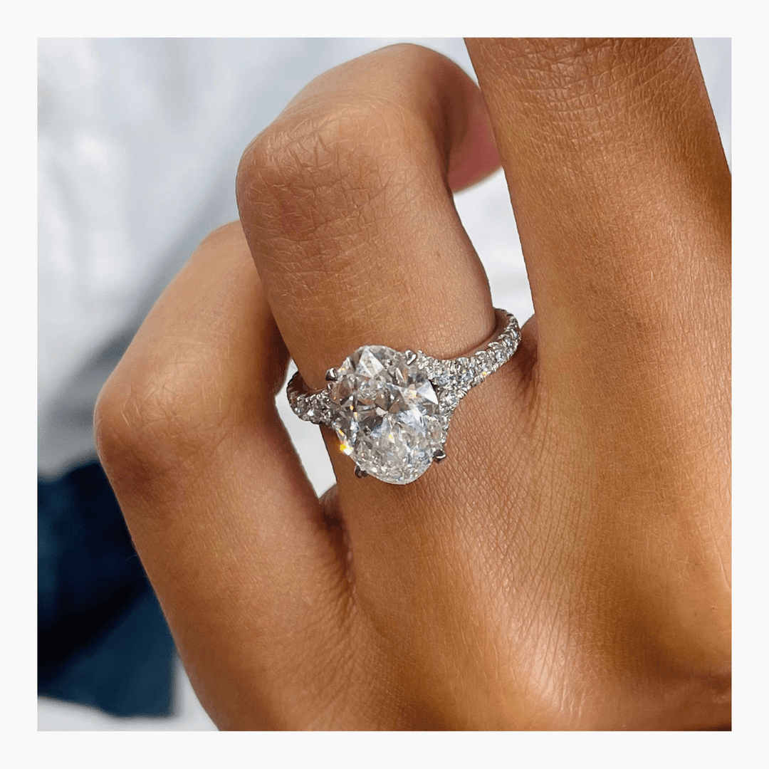 Oval cluster engagement ring close-up showing high clarity diamond clarity