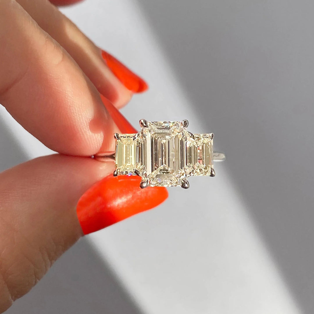 Buy emerald cut three stone diamond engagement ring with free shipping