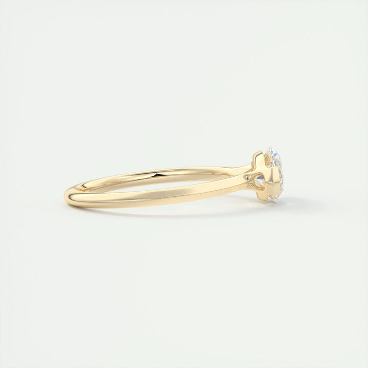 Close-up of marquise cut center diamond in solitaire engagement ring