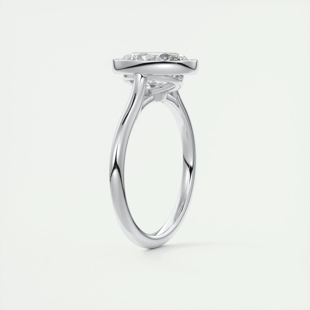 Oval bezel lab grown diamond ring fitted on finger