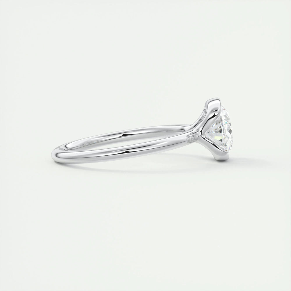 IGI certified oval cut diamond in bezel engagement ring setting