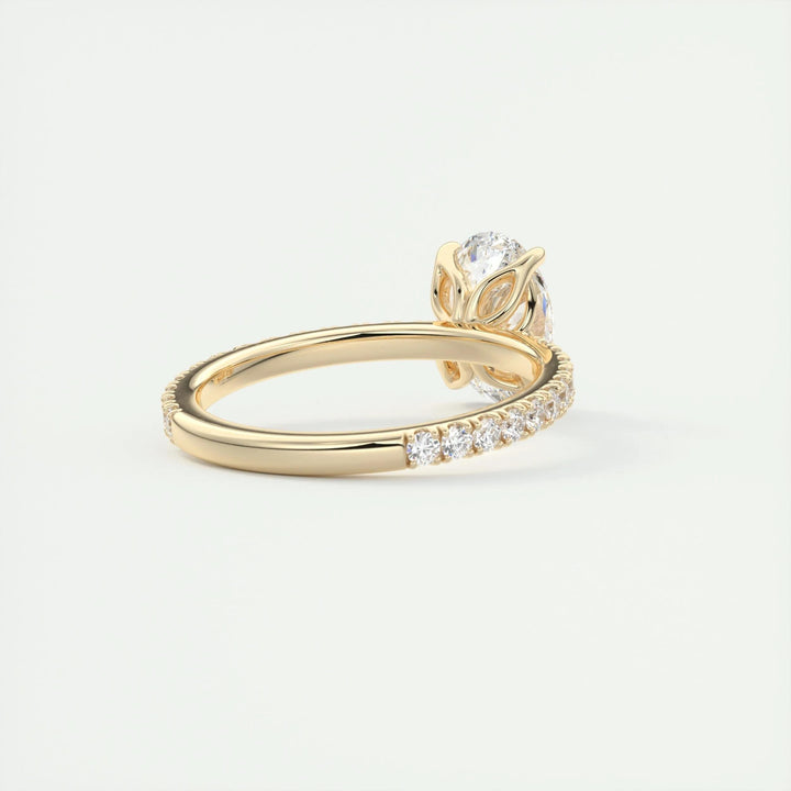 Detailed close-up of oval pave diamond engagement ring