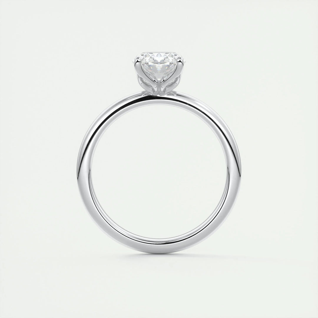 Oval cut solitaire engagement ring shown in real-life wear