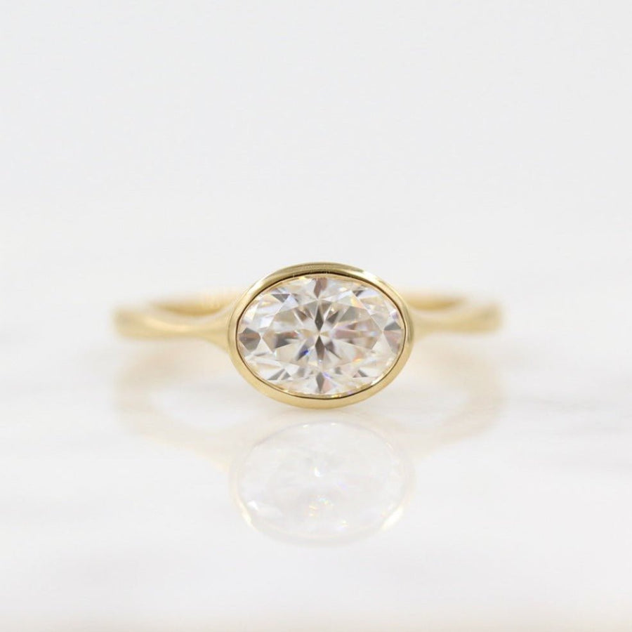 1.50CT oval cut bezel engagement ring available to buy now
