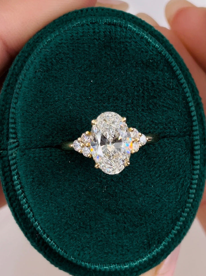 Oval cluster engagement ring with brilliant diamond sparkle