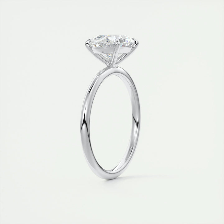 Oval east west engagement ring finished in polished solid gold