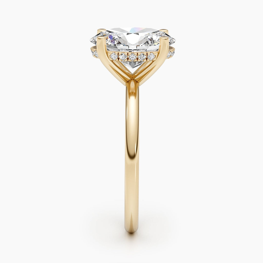 Classic oval hidden halo engagement ring crafted for everyday wear